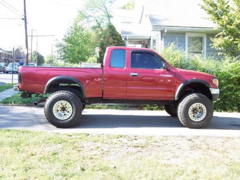 1997 Toyota Tacoma SR5 Extended Cab 4x4 in Sunfire Red Pearl Metallic