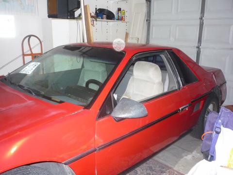 1988 Pontiac Fiero I4 in Flame Red