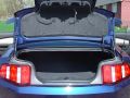 There is ample trunk space in the 2012 Mustang. Here is a photo of the open trunklid.